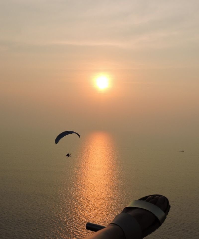 Paramotoring adventure flying over beautiful Ratnagiri beaches.