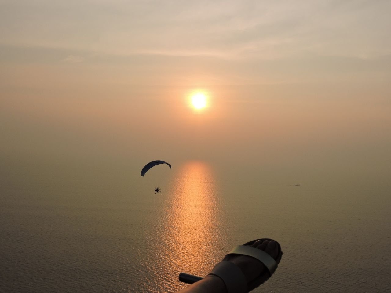 Paramotoring adventure flying over beautiful Ratnagiri beaches.